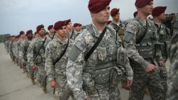 Members of the U.S. Army 173rd Airborne Brigade march after attending a welcome ceremony upon their arrival by plane at a Polish air force base on April 23, 2014 in Swidwin, Poland.