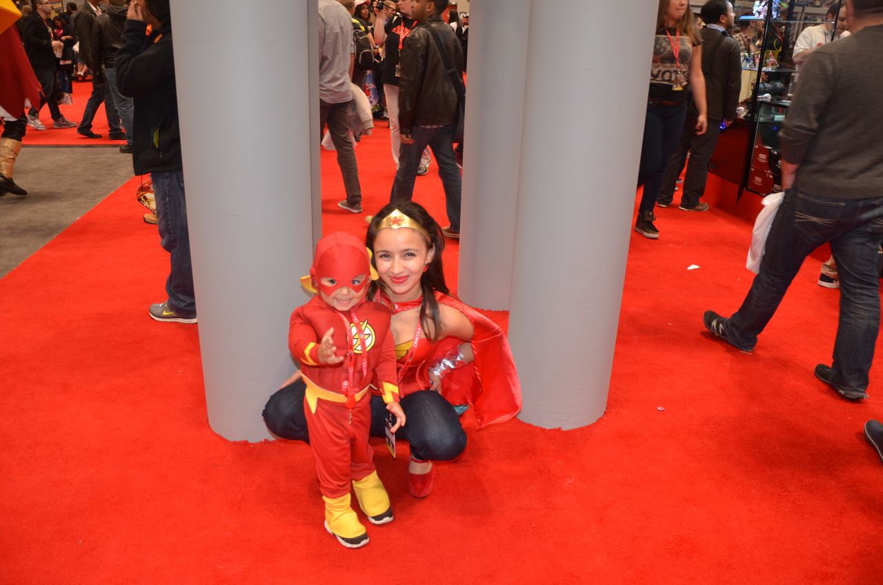 Kids can often be seen dressing like their adult cosplaying counterparts at conventions like <a href="http://ireport.cnn.com/docs/DOC-1047486">New York Comic Con</a>. Here's Wonder Woman posing with a pint-size Flash at last year's convention in the Big Apple.