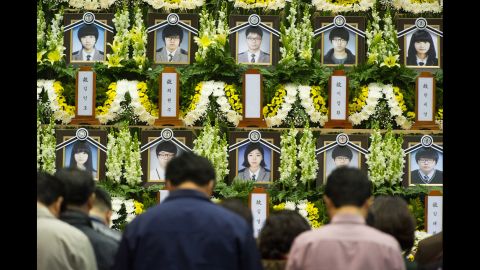 People attend a memorial for the victims at the Olympic Memorial Hall in Ansan on Thursday, April 24.