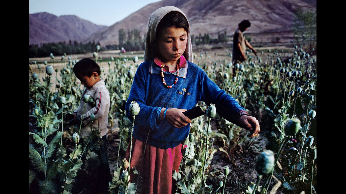 Children work in an opium field in Badakhshan, 1992.