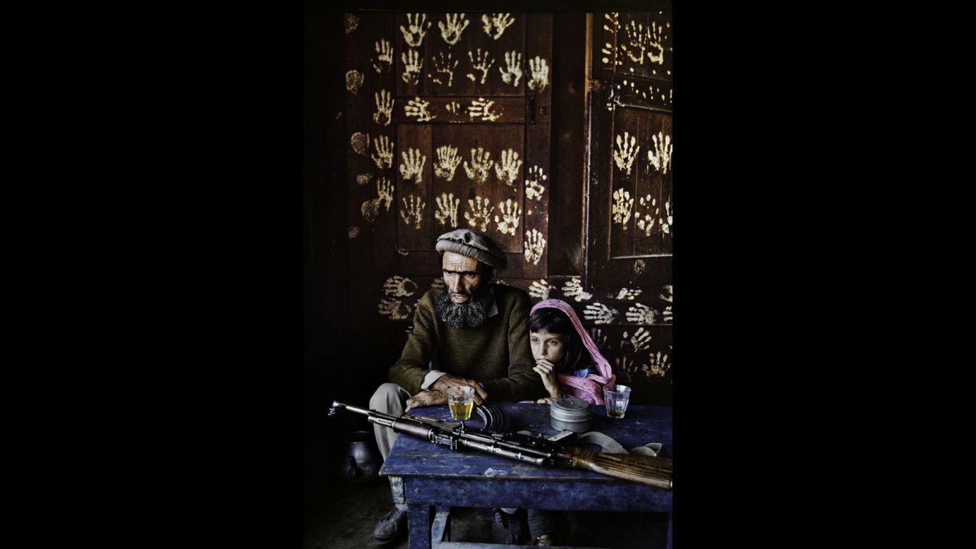 A father and daughter at home in Kamdesh, 1992.