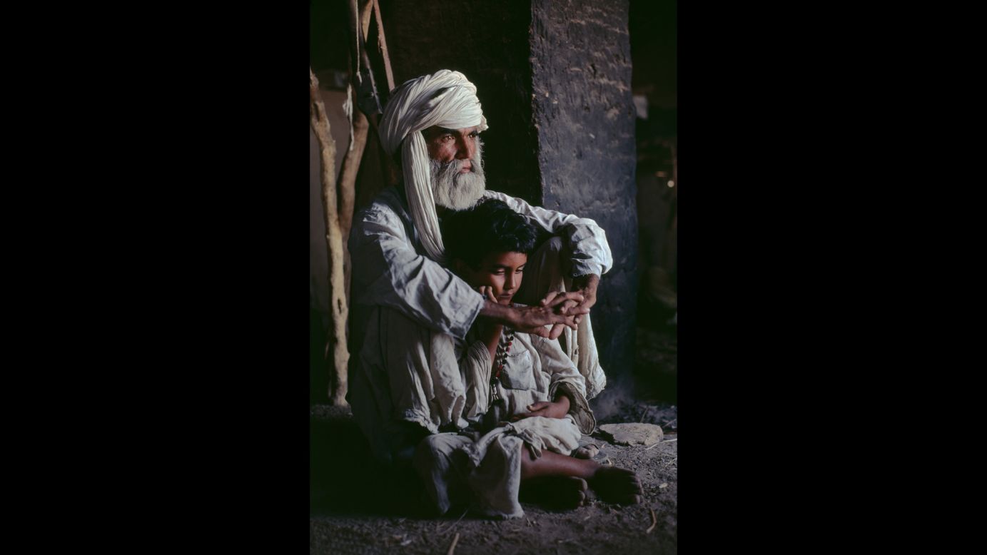 A father and son in Helmand province, 1980.