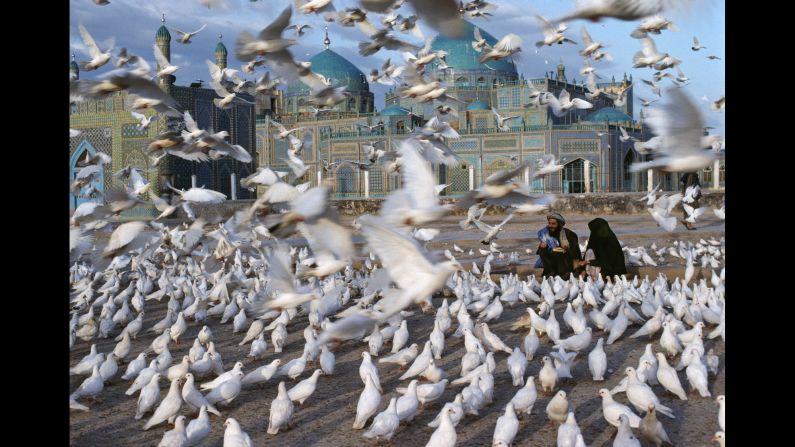Doves fly in front of the Blue Mosque in Mazar-i-Sharif, 1992. <a href="http://cnnphotos.blogs.cnn.com/2012/10/27/curiosity-inspires-iconic-photographer/">See what inspires iconic photographer Steve McCurry.</a>