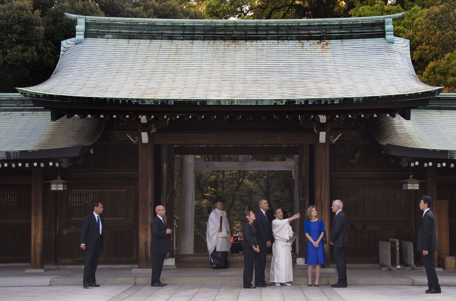 Obama was accompanied to the shrine by U.S. Ambassador to Japan Caroline Kennedy, in blue, and her husband, Edwin Schlossberg, second from right.
