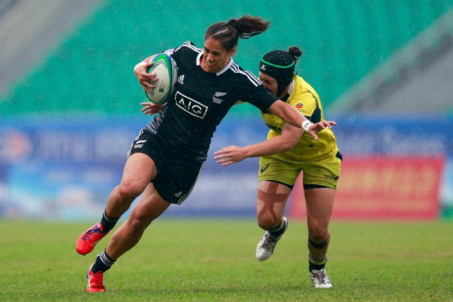 McAlister tries to evade a tackle by Emilee Cherry during New Zealand's win in April's final in China. Her opponent is the series' leading try scorer this season with 24 to McAlister's 20. 