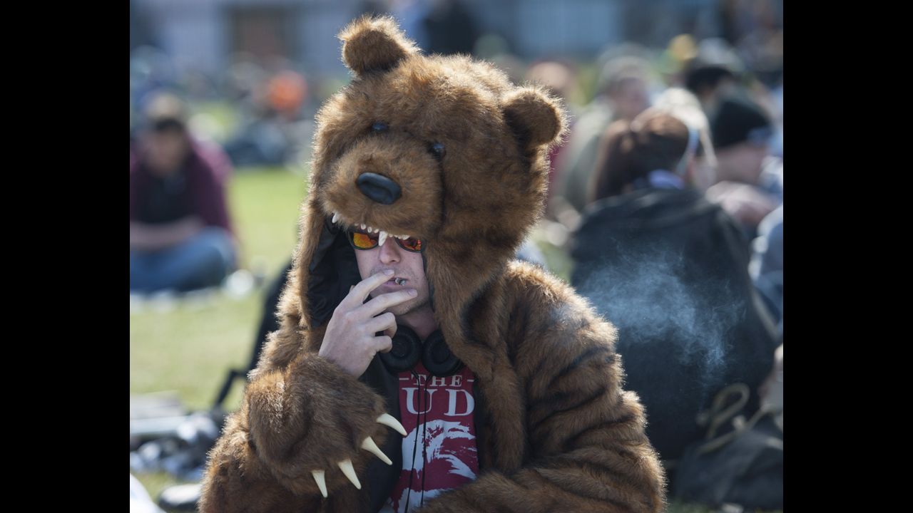 A man in a bear costume smokes a joint at the Fill the Hill marijuana rally on Parliament Hill in Ottawa on Sunday, April 20. 420 is a once clandestine term used in pot culture to refer to marijuana. <a href="http://www.cnn.com/2014/04/20/us/denver-420-weekend/">Though the date has long been observed in Colorado</a>, this is the first celebration since recreational sales of marijuana became legal in the state on New Year's Day.