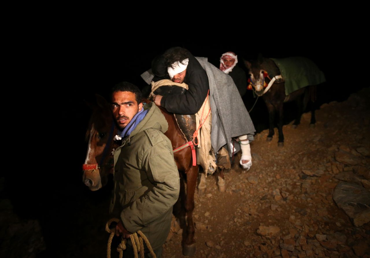 Saleh Zawaraa, 28, arrives on horseback after being severely injured by a tank shell as he tried to bring bread into the Syrian village of Beit Jinn on Sunday, April 20. The United Nations says more than <a href="http://www.cnn.com/2013/07/25/world/meast/syria-violence">100,000 people have been killed in Syria</a> since the opposition launched anti-government protests in 2011.