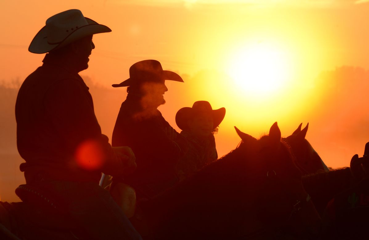 Worshippers join for a sunrise service at the No Fences Cowboy Church on Easter Sunday, April 20, in Falkville, Alabama. 