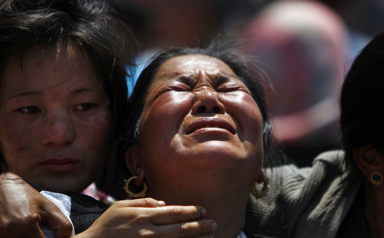 Relatives of mountaineers killed in an avalanche on Mount Everest cry during the funeral ceremony in Katmandu, Nepal, on Monday, April 21. A high-altitude avalanche killed 13 Sherpa guides on Friday in the single deadliest accident on Mount Everest. Three more Sherpas are missing and feared dead. A Buddhist clergy <a href="http://www.cnn.com/2014/04/23/world/asia/nepal-everest-avalanche/index.html">commended all 16 souls in a religious ceremony</a>.