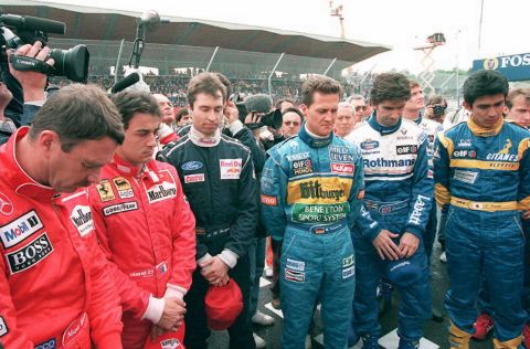 F1 drivers paid tribute to both Senna and Ratzenberger following the double tragedy. Left to right -- Britain's Nigel Mansell, Jean Alesi of France, Germany's Heinz-Harald Frentzen and Michael Schumacher, Briton Damon Hill and Aguri Suzuki of Japan.