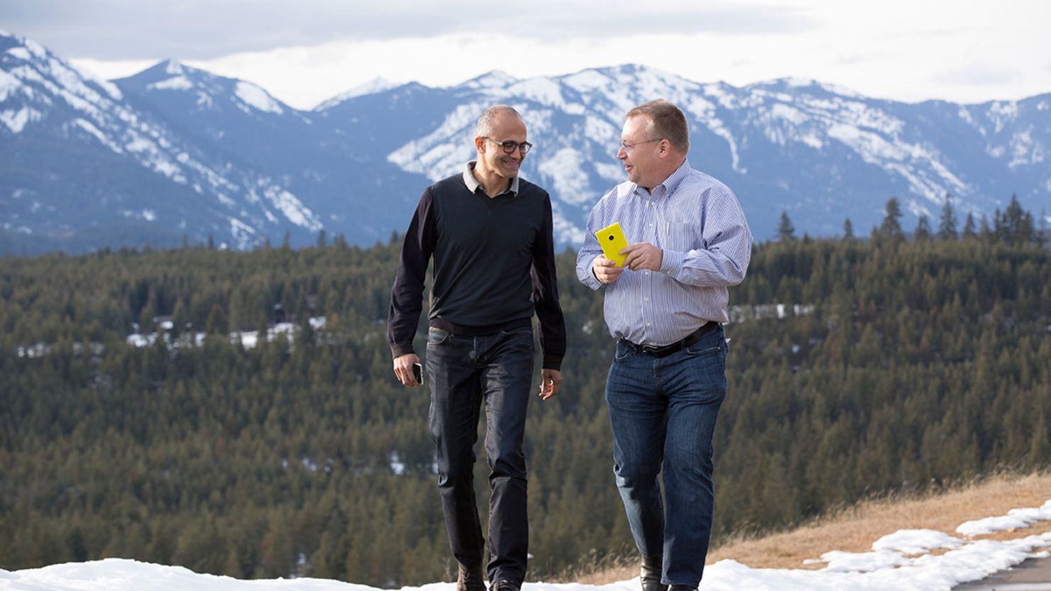 Ahh, bromance. Microsoft CEO Satya Nadella, left, and former Nokia CEO Stephen Elop "share a moment," in Microsoft's words.
