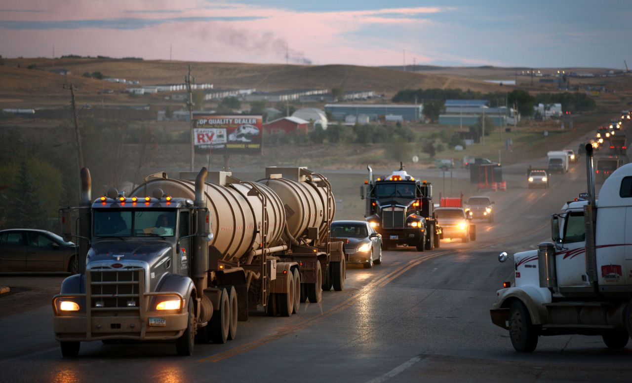 Traffic generated by an oil boom lines the main street in Watford City, North Dakota, on October, 11, 2011. The Bakken oil formation, which stretches from South Dakota into Saskatchewan and could contain more than 4 billion barrels of oil, has sparked an oil boom in towns like Watford City.