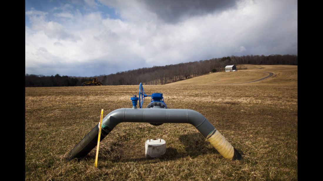 A gas pipeline protrudes from the ground at a farm outside Dimock, Pennsylvania, in March 2012. Proponents of fracking say petroleum extraction is good for the economy and boosts national security by providing more energy sources.