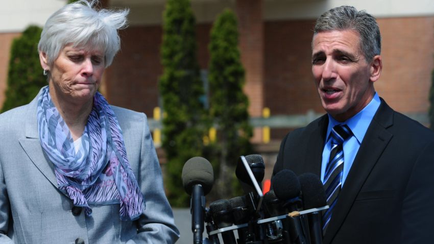 Milford Police Chief Keith Mello, right, speaks while Schools Superintendent Elizabeth Feser listens during a news conference at Jonathan Law High School in Milford, Conn., Friday, April 25, 2014. Authorities have confirmed that Maren Sanchez, 16, was stabbed to death Friday. A teenage boy is in custody, and police are investigating whether the attack stemmed from her turning down an invitation to be his prom date. (AP Photo/The New Haven Register, Peter Hvizdak) MANDATORY CREDIT