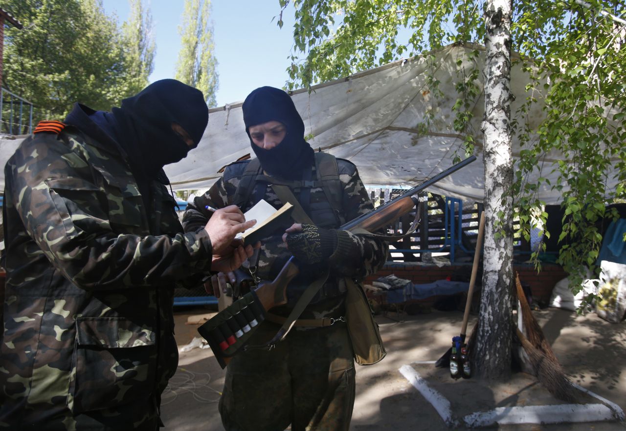 Pro-Russia militants keep records of their duty in Slovyansk on April 25.