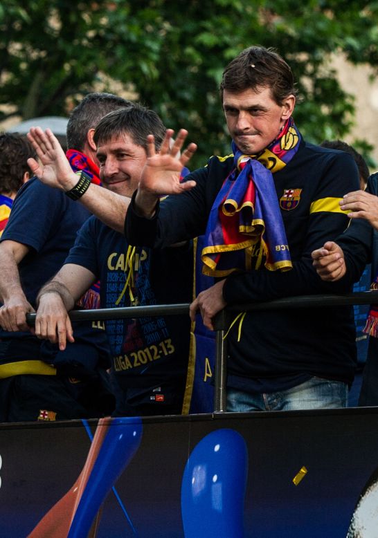 Vilanova and his assistant Jordi Roura celebrate as Barcelona win La Liga with a total of 100 points - the highest total in the club's history.
