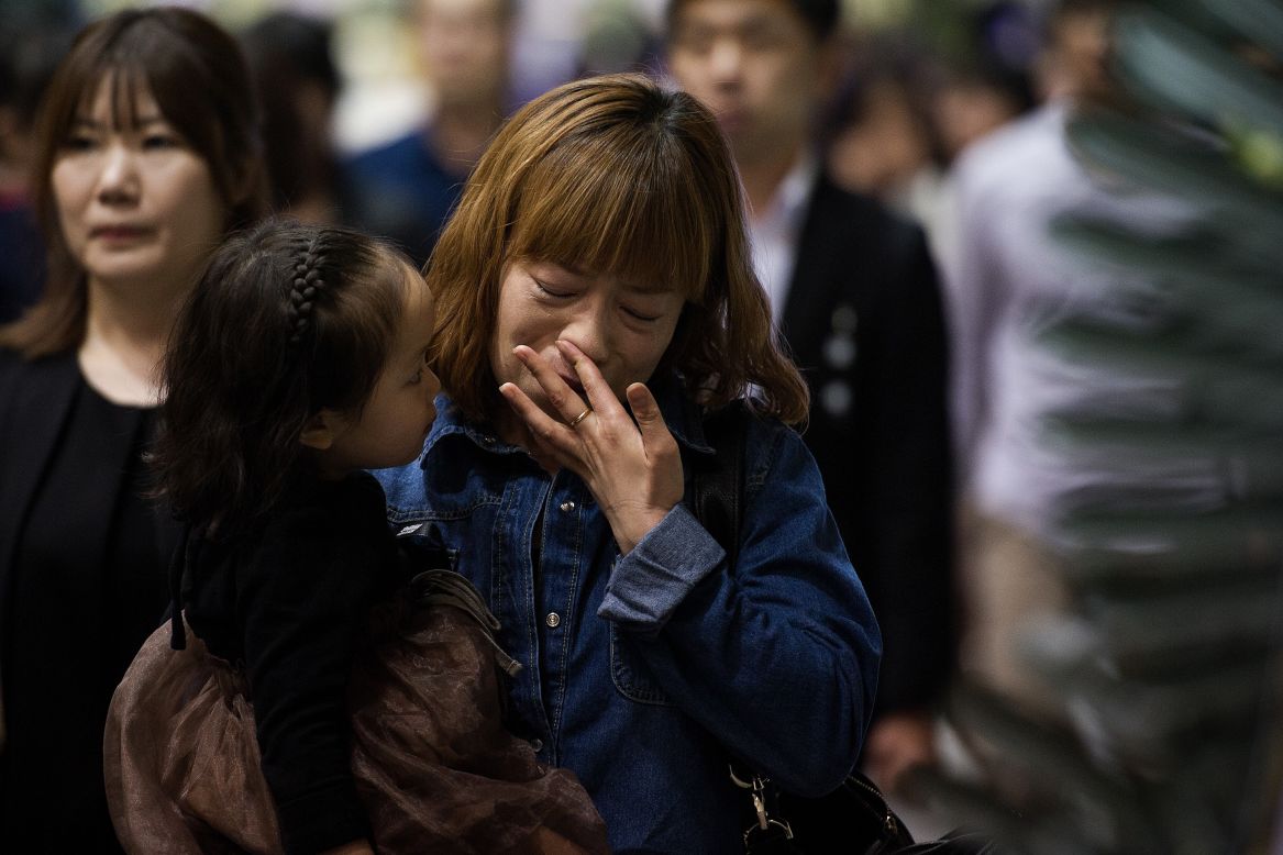 People in Ansan attend a memorial for the victims on April 26.