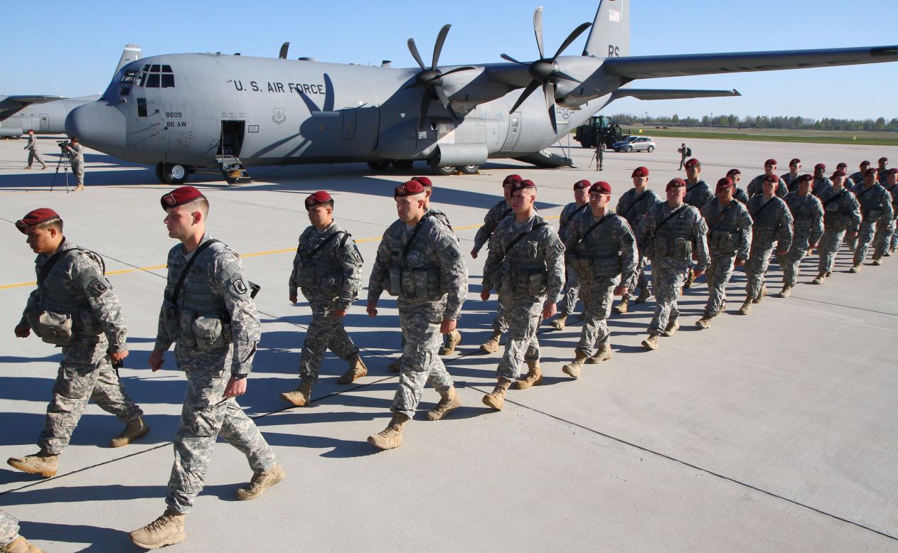 U.S. troops arrive at an air force base near Siauliai Zuokniai, L