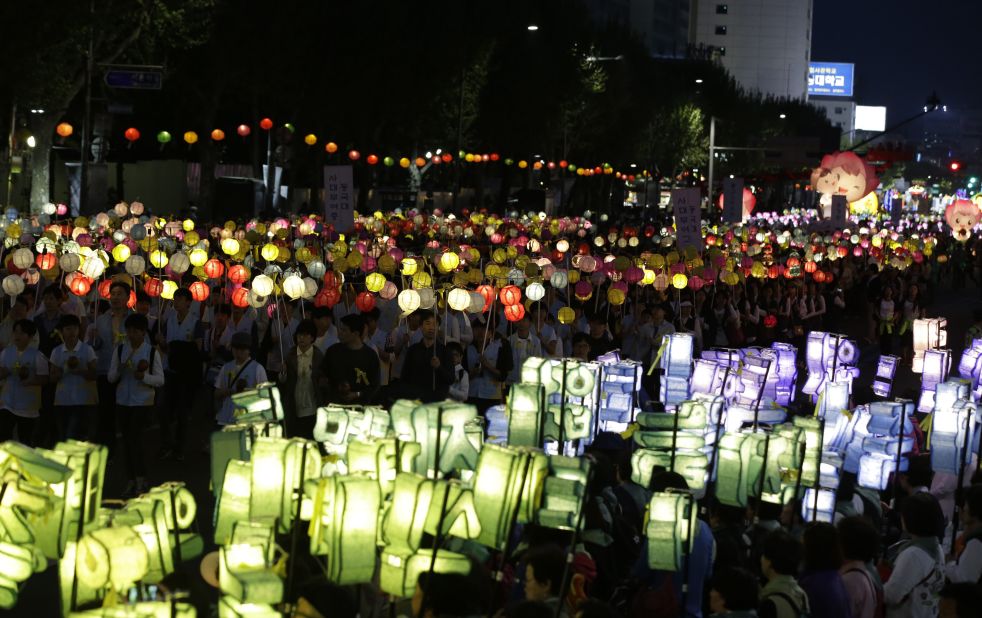 South Korean Buddhists carry lanterns in a parade in Seoul on Saturday, April 26, to honor the memory of the dead and the safe return of the missing.