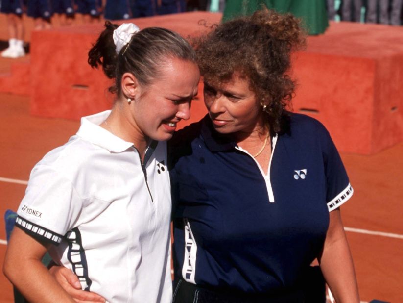 Hingis is comforted by her mom after losing a turbulent French Open in 1999 to Germany's Steffi Graf. The French is the only grand slam Hingis failed to win.