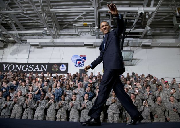 Obama waves to the crowd as he arrives to speak in the Collier Field House at U.S. Army Garrison Yongsan in Seoul, South Korea, on April 26.