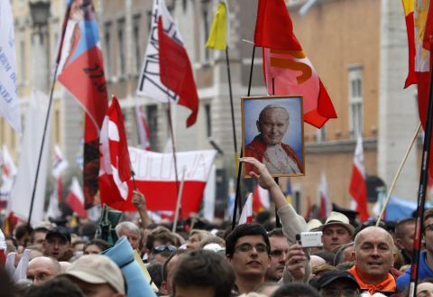 Pilgrims crowd St. Peter's Square to attend the ceremony for the canonizations of Pope John XXIII and Pope John Paul II on April 27.