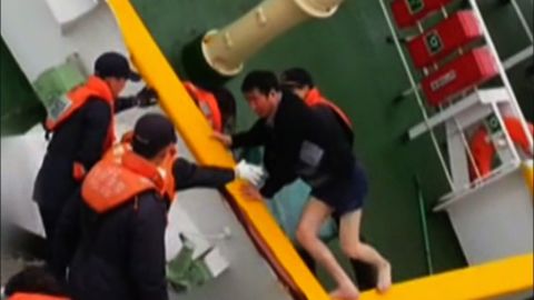 The image of Sewol ferry captain Lee Joon-seok  being rescued in his shorts enraged South Korea. 