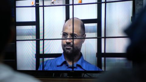 File photo: The second son of former Libyan leader Moammar Gadhafi appears via video link at a trial.