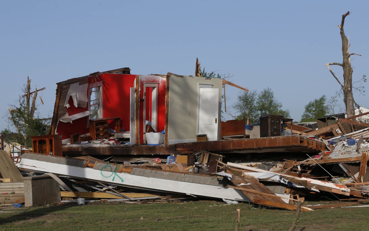 The remains of a home are seen in Baxter Springs on April 28. Sixty to 70 homes and at least 20 businesses there were reported destroyed, Allison said.