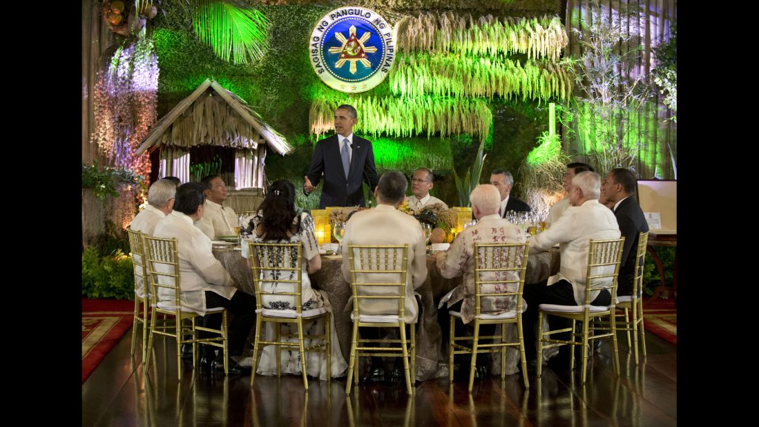Obama stands to speak as he attends a state dinner at the Malacanang Palace on April 28.