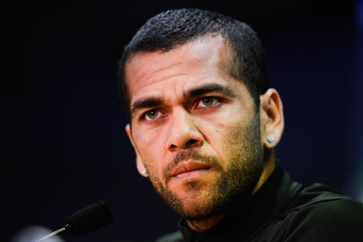 Dani Alves has been applauded for his response to being racially abused during a football match. The Barcelona player had a banana thrown at him during Sunday's game at Villarreal, so he picked it up and took a bite out of it before continuing to play.