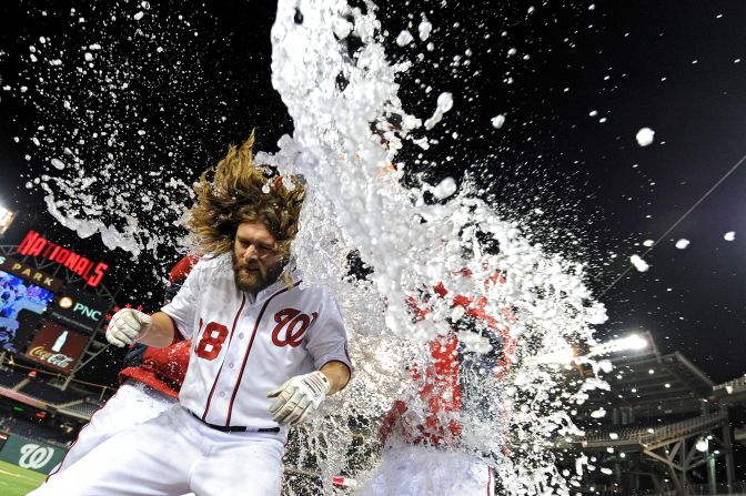 Jayson Werth is doused with water by his teammates after he scored the winning run in the Washington Nationals' ninth-inning comeback versus the Los Angeles Angels of Anaheim on Wednesday, April 23.