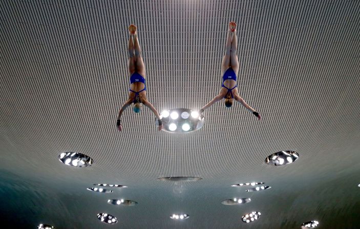 Tonia Couch and Sarah Barrow practice a synchronized dive Friday, April 25, at the FINA/NVC Diving World Series in London. The Brits won silver in the 10-meter platform, losing out to Chen Ruolin and Liu Huixia of China.