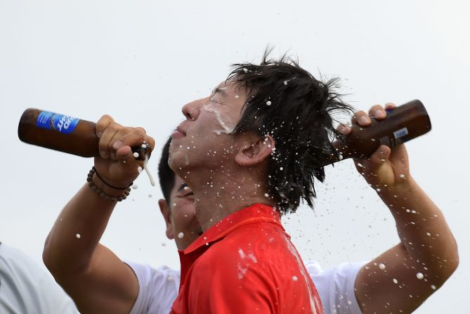 Seung-Yul Noh is doused with beer by Y.E. Yang, a fellow South Korean golfer, after Noh won the Zurich Classic of New Orleans on Sunday, April 27. It was Noh's first win on the PGA Tour.