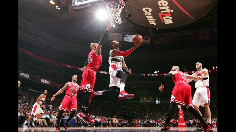 John Wall of the Washington Wizards rises for a layup on Sunday, April 27, during Game 4 of the NBA playoff series versus the Chicago Bulls. The Wizards won the game to take a 3-1 lead in the best-of-seven series.