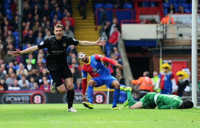 Edin Dzeko of Manchester City celebrates a goal during an English Premier League match against Crystal Palace on Sunday, April 27, in London. Manchester City won the game 2-0.