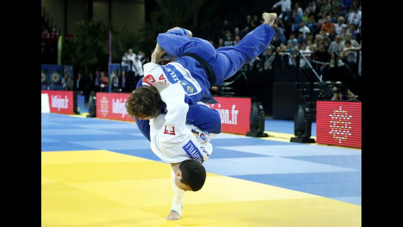 Avtandil Tchrikishvili of Georgia, bottom, competes against Loic Pietri of France at the European Judo Championships in Montpellier, France, on Friday, April 25. Tchrikishvili won the match, which was the final in the 81-kilogram category (nearly 179 pounds).