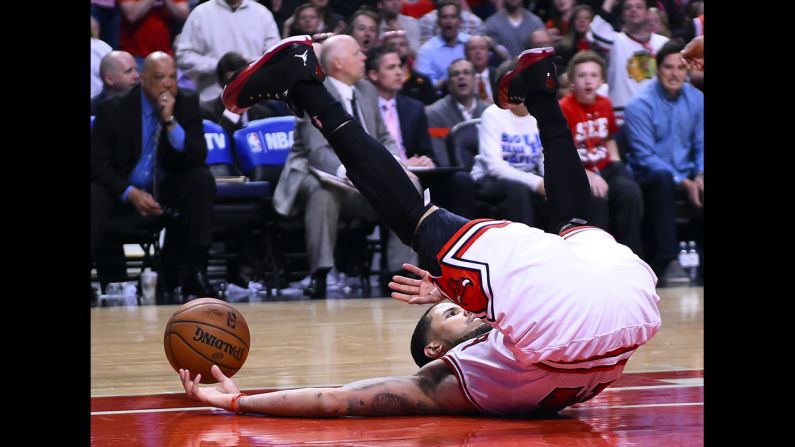 Chicago Bulls guard D.J. Augustin gets knocked to the floor Tuesday, April 22, in Game 2 of the first-round playoff series against the Washington Wizards. The Wizards won the game to grab a 2-0 series advantage.