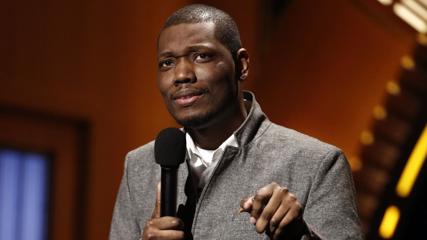 Comedian Michael Che performs during 'Late Night with Seth Meyers' in February 2014 in New York City. 