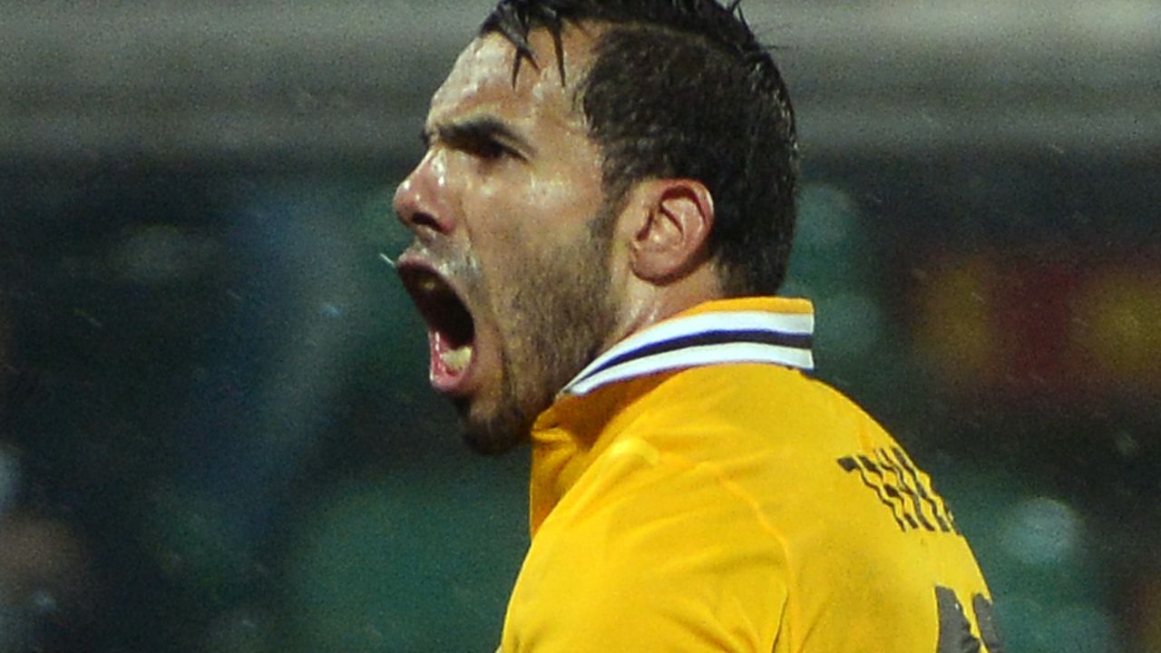 Carlos Tevez shows his delight and relief with a fine equalizer for Juventus in their 3-1 win at Sassuolo.