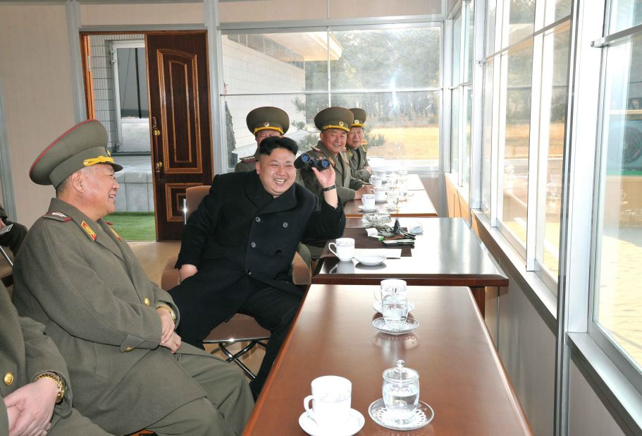 A picture released Tuesday, March 18, by the KCNA shows Kim attending a shooting practice at a military academy in Pyongyang.