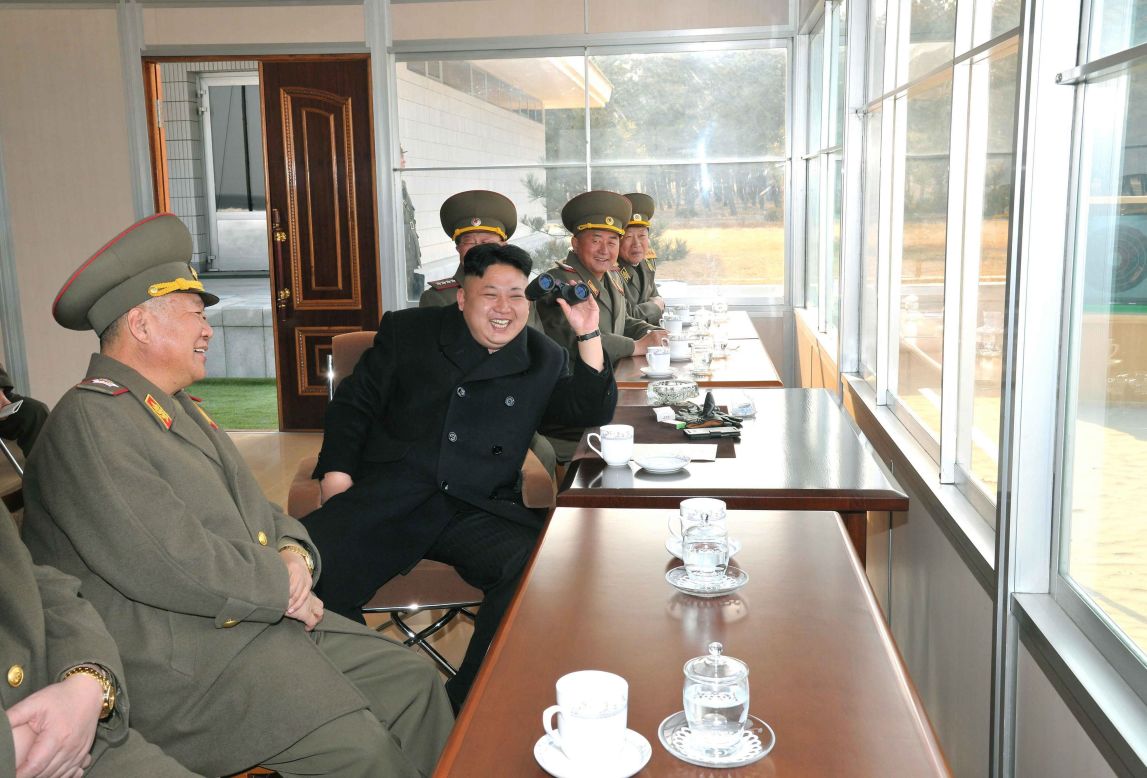 A picture released Tuesday, March 18, by the KCNA shows Kim attending a shooting practice at a military academy in Pyongyang.
