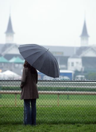 Umbrellas have been a must-have item in the buildup to the Kentucky Derby but forecasters predict improved weather on Saturday.