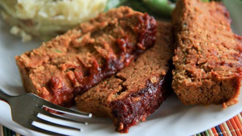 This vegan two-bean meatloaf features pinto beans, chickpeas and sunflower kernels, topped with a molasses glaze.