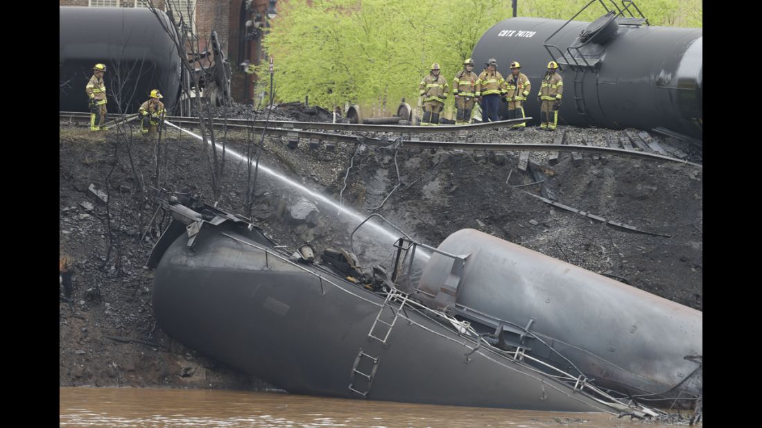 Police said 13 or 14 tanker cars were involved in the derailment.