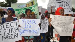 Women attend a demonstration calling on the government to rescue kidnapped schoolgirls of a government secondary school Chibok, in Abuja, Nigeria on Wednesday, April 30.