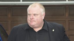 Toronto Mayor Rob Ford leave his home early Thursday May 1, 2014, in Toronto. Ford will take an immediate leave of absence to seek help for alcohol, he said, as a report surfaced about a second video of the mayor smoking what appears to be crack cocaine. (AP Photo/The Canadian Press, Frank Gunn)