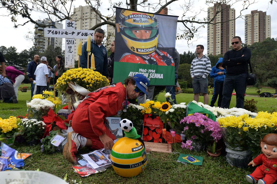 Fans have flocked to Ayrton Senna's grave in recent days to mark the 20th anniversary of the triple world champion's death. The Brazilian passed away after a crash at the Imola Circuit in 1994 during the San Marino Grand Prix.