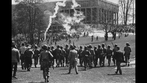The Ohio National Guard is called in to disperse a rally scheduled for at noon on May 4, 1970. Shortly after the protest began, guardsmen fired tear gas at the students. Some students said they were surprised the guardsmen followed them as they ran away from the tear gas. The guardsmen were clearly armed, but many students later said they believed their weapons were not loaded with actual ammunition.