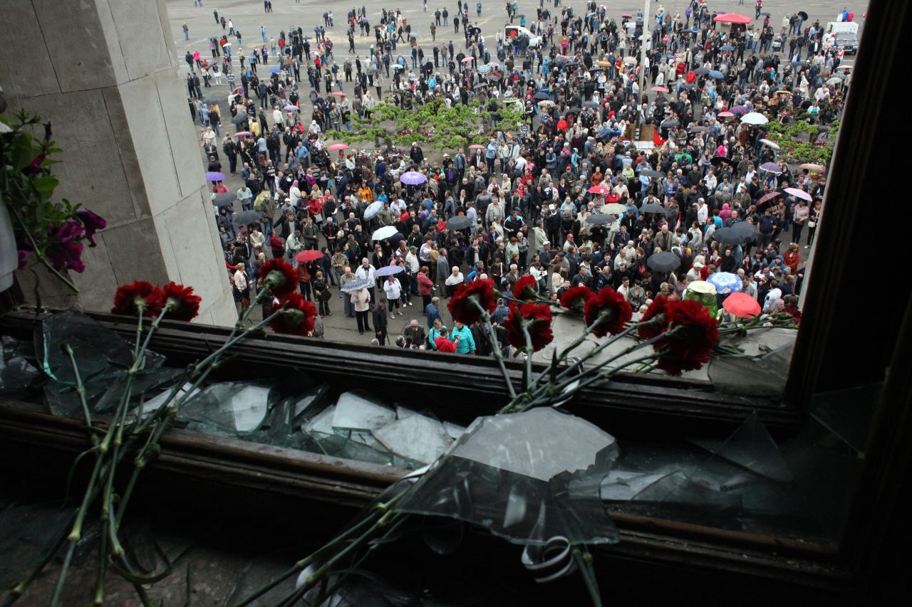 Red carnations are left inside the burned trade union building in Odessa on May 4. Flowers, candles and photos of the dead piled up outside the charred building, a day after brutal clashes and the fire claimed 46 lives.